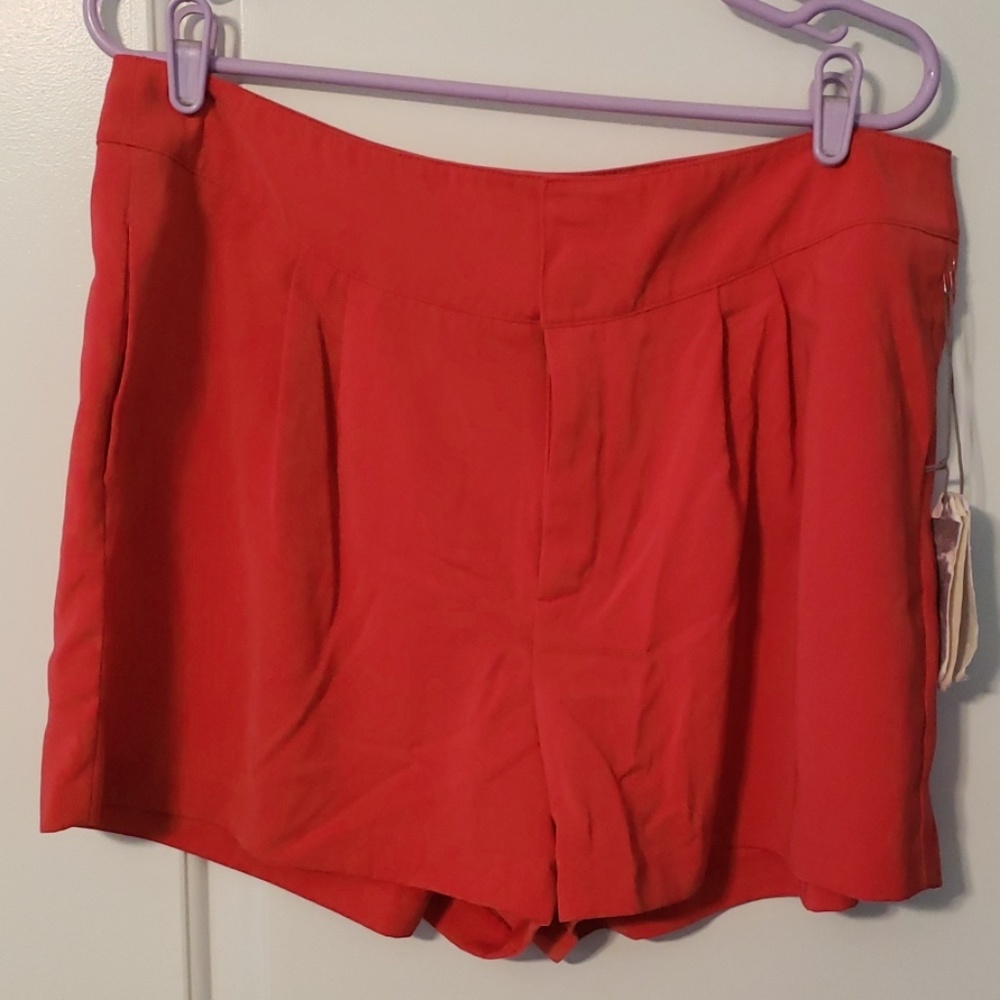 Jennifer Lopez Coral dress/club shorts
